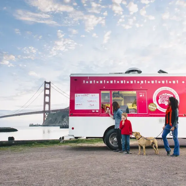 Visitors enjoy ice cream from the Garden Creamery truck.
