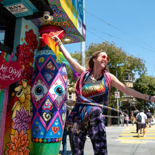 Staff at Love On Haight greet visitors to the neighborhood