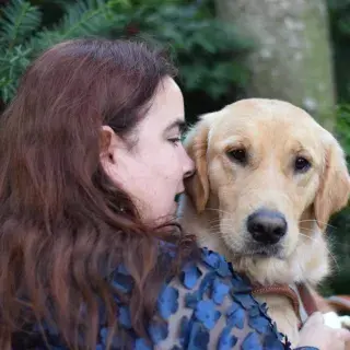 Author and educator Maia Scott, with her guide dog, Gleam.