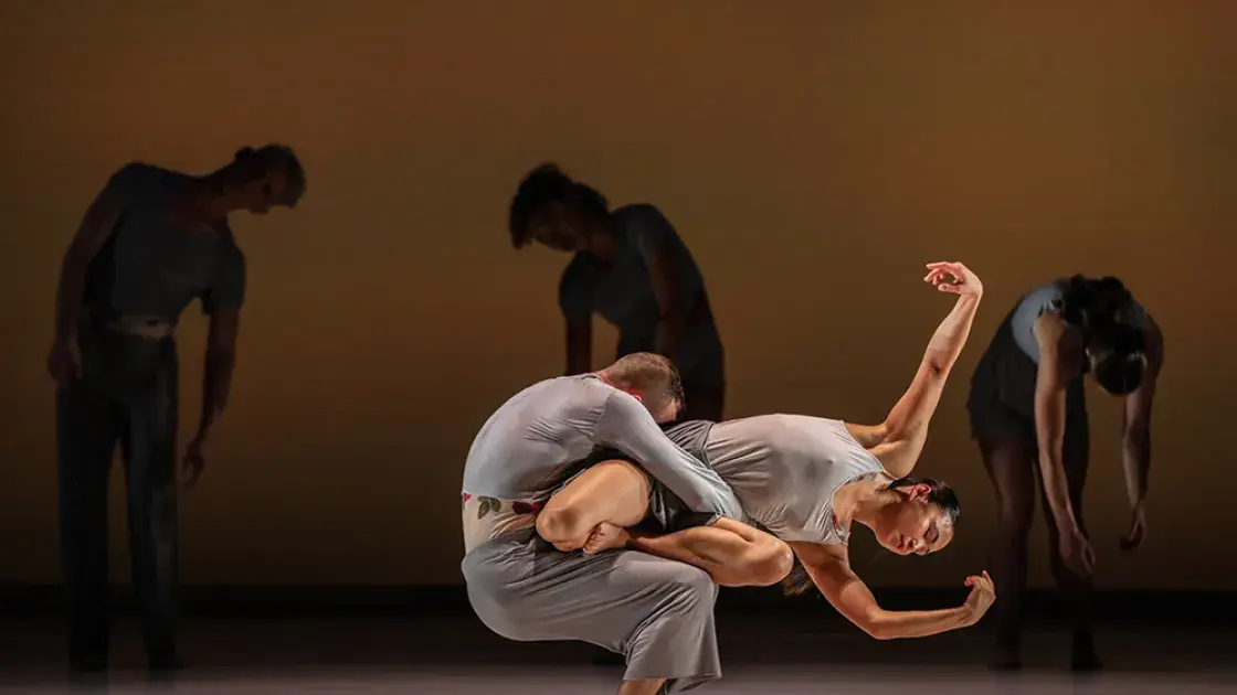 Dancers in the ODC company perform on stage.